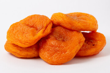 Pile of Dried Apricots on White Background