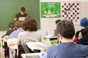 School children are participating actively in class