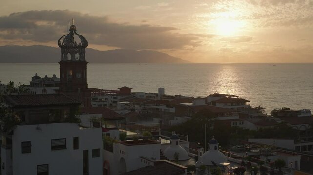 View from Faro de Matamoros Lighthouse in Colonia Centro, beach and sunset in the background Puerto Vallarta, Jalisco, Mexico
