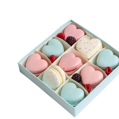 Heart-shaped macarons in pastel colors with berries in a gift box, delicate dessert, romantic treat.