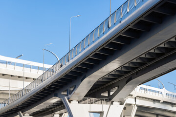 Bottom view of metal road bridges. Details of the intracity toll highway