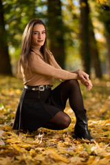 Latin lady in a colorful park in the autumn