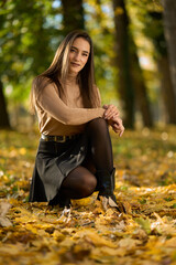 Latin lady in a colorful park in the autumn