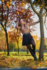 Latin lady in a colorful park in the autumn
