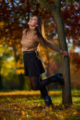 Latin lady in a colorful park in the autumn