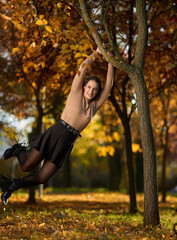Latin lady in a colorful park in the autumn