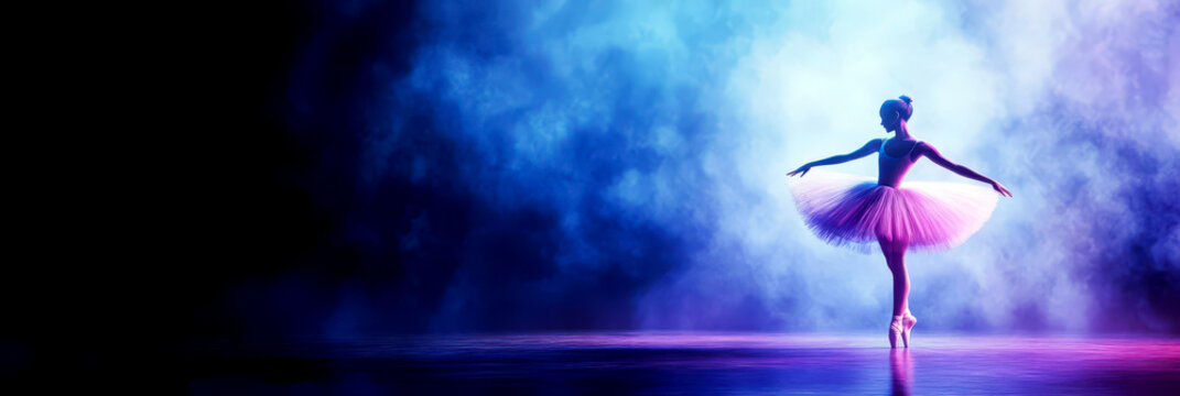 Graceful ballet dancer celebrating world theatre day in vibrant stage lighting. Horizontal banner. Copy space. International Dance Day