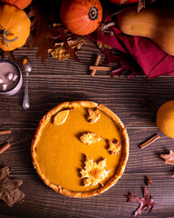 Homemade Pumpkin Pie with Rustic Autumn Decor