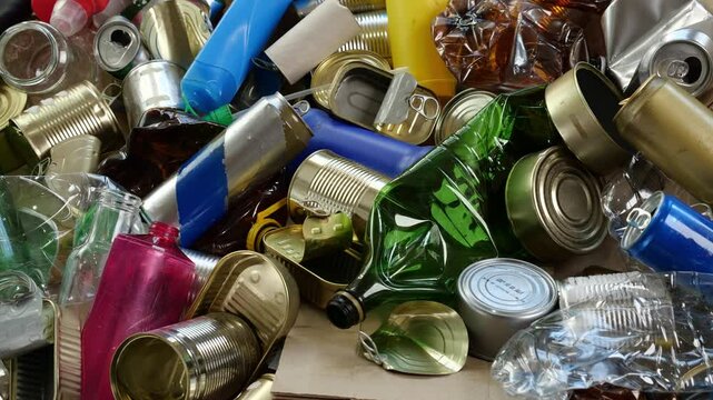 Plastic glass metal paper cardboard waste and recycling. Sorted recyclables materials. Waste sorting center. Recycling collection
