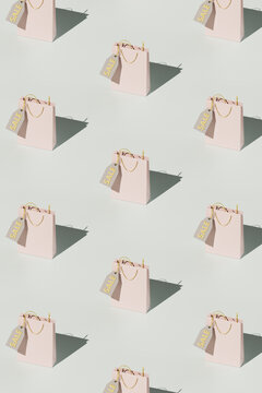 3D Render of Repeated Shopping Bags with Sale Tags Pattern