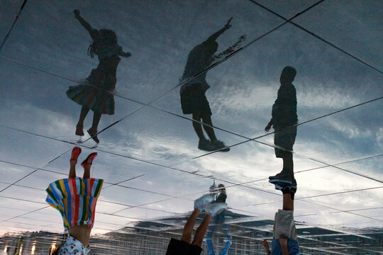 kids jumping reflection