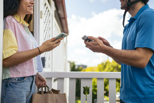 Delivery man delivers order to home
