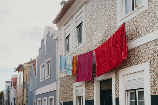 A row of European-style houses with intricate tile patterns