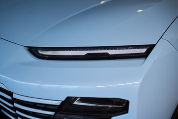 Close up of a cars headlight, part of automotive design