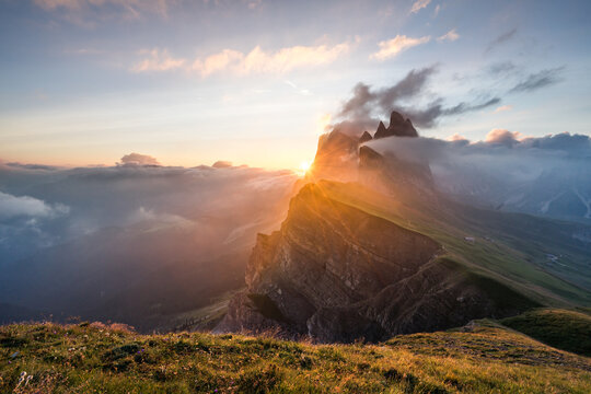 Sunrise illuminating Seceda Mountain
