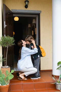 Mom says goodbye to the child