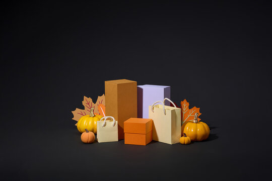 Colorful gift bags surrounded by small orange, white, and yellow