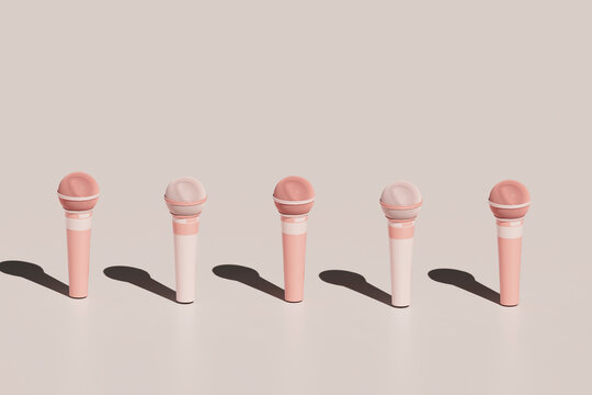 3D Render of Five Pink Microphones Standing Upright
