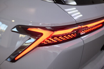 Fototapeta premium Closeup of a cars automotive tail brake light