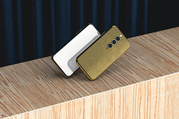 Two gold mobile phones on stage with curtain and wooden backdrop
