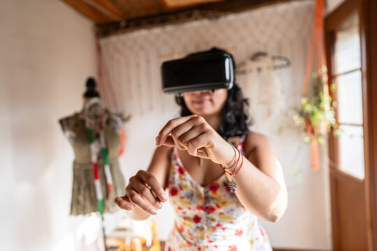 Fashion designer using vr technology creating new clothes