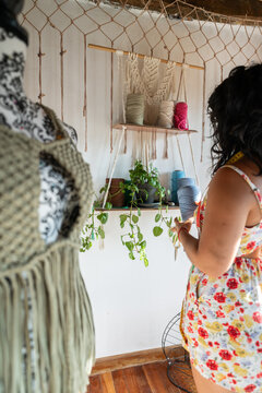 Fashion designer choosing yarn for macrame wall hanging decoration