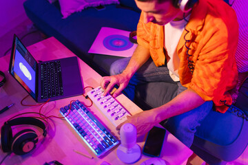 Musician Tweaking Audio Setup