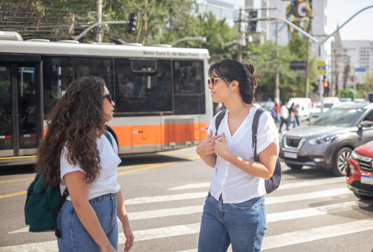 Two Women talking at Faria Lima Street in S&atilde;o Paulo