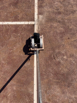 Red Clay Tennis Court   with line sweeper machine