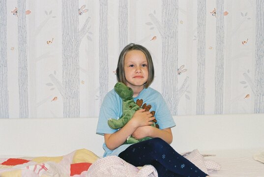 The dissatisfied girl does not want to go to bed.