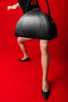 Stylish Woman Posing With Large Black Leather Handbag
