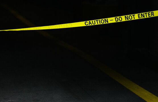 Yellow caution tape marking restricted area in New York City at 