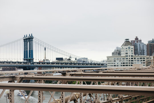 View of Manhattan Bridge and surrounding buildings on a cloudy d