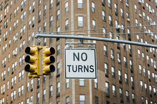 No turns traffic sign with yellow traffic lights in New York City