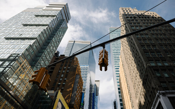 Skyscrapers and traffic light in NYC bustling urban landscape