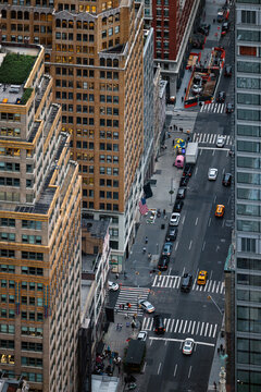 View of bustling New York City street with taxis and skyscrapers