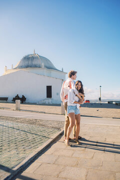 Family walking near Ermida de S&atilde;o Sebasti&atilde;o in Ericeira