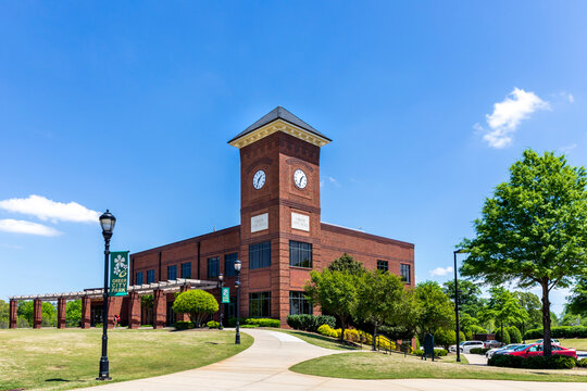 GREER, SC, USA 24 APRIL 2022: Greer City Hall, diagonal front view on sunny, blue sky day.