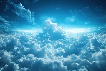 A breathtaking aerial view of fluffy white clouds against a vibrant blue sky, with the sun shining through.