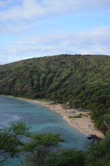 Scenic View of Hanauma Bay Beach and Lush Green Hills, Oahu, Hawaii