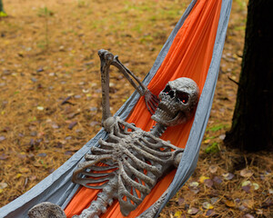skeleton in hammock