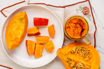 fresh, organic Sliced  pumpkin on a cutting board