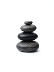 Balanced Massage Stones Stacked Elegantly on Pristine White Background for Serene Relaxation