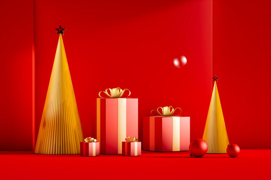 Festive holiday display featuring gold trees and red gifts