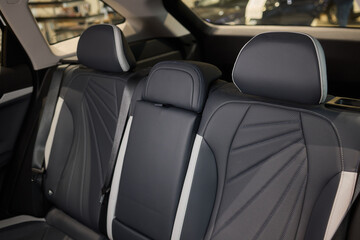 Car back seat with headrest and arm rest, a comfortable automotive fixture
