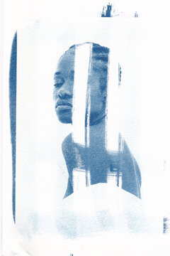 Cyanotype portrait of a woman with abstract strokes