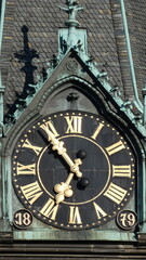 clock on the wall of the church