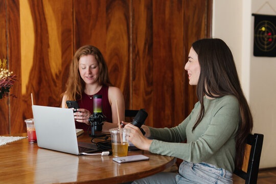 Podcaster conducting an interview with his guest.