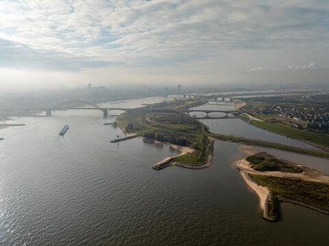 Aerial view of the room for the river project at the Dutch city of Nijmegen, with constructed additional waterway to provide more space for the Waal river during high water, future proof design