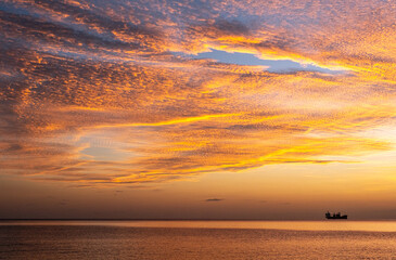 Cargo ship at sunset